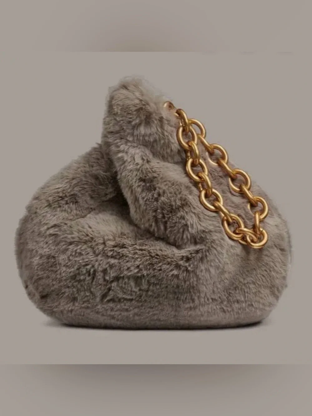 Donna Karan Lawerence Faux Fur Wristlet. Cloud.